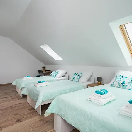 Appartement Apartamentypodcisemdeluxe